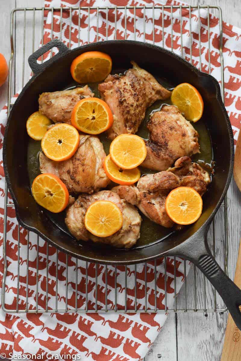 Roasted Clementine Five Spice Chicken in a skillet