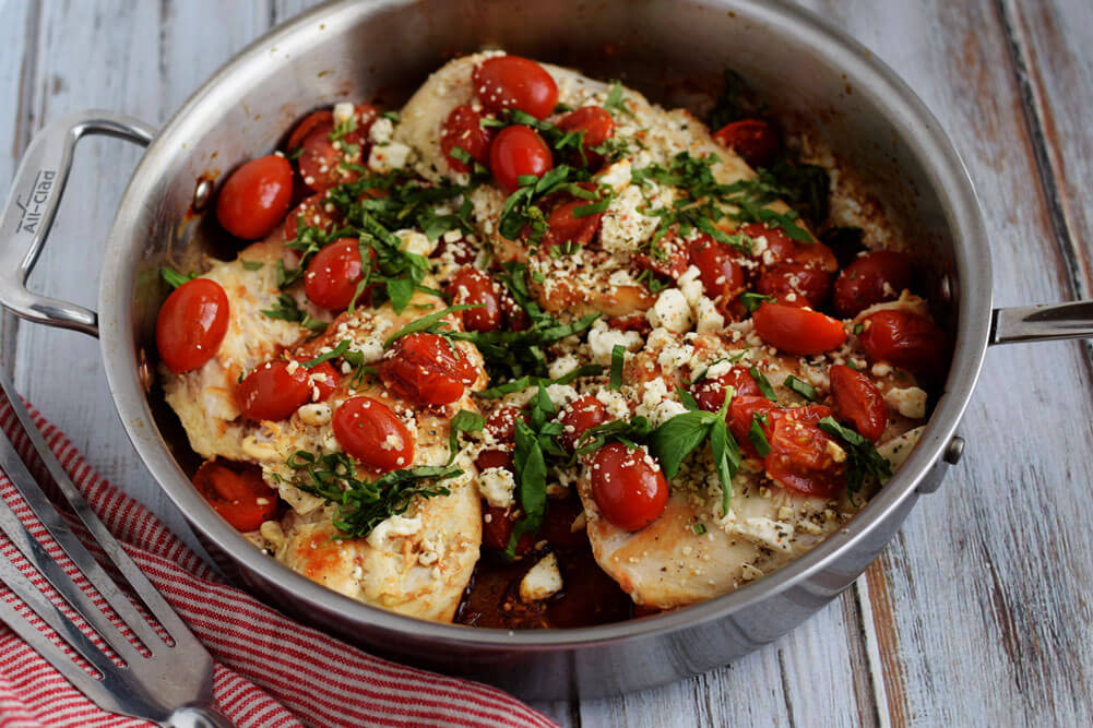 Easy Balsamic Chicken garnished with basil and feta