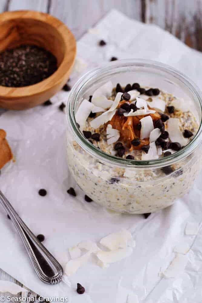 Overnight Oats with chia seeds and chocolate chips in a glass bowl