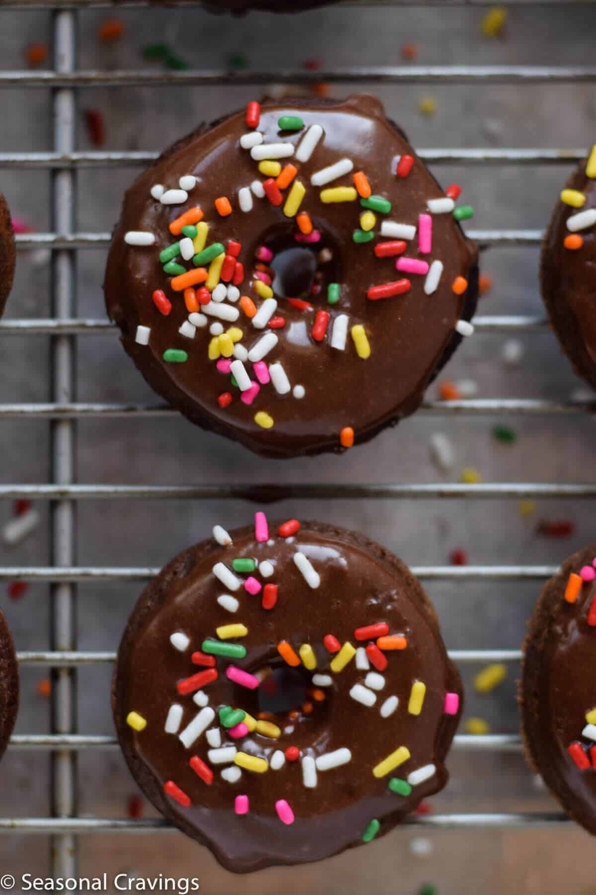 Gluten Free Chocolate Cake Donuts on a cooling rack