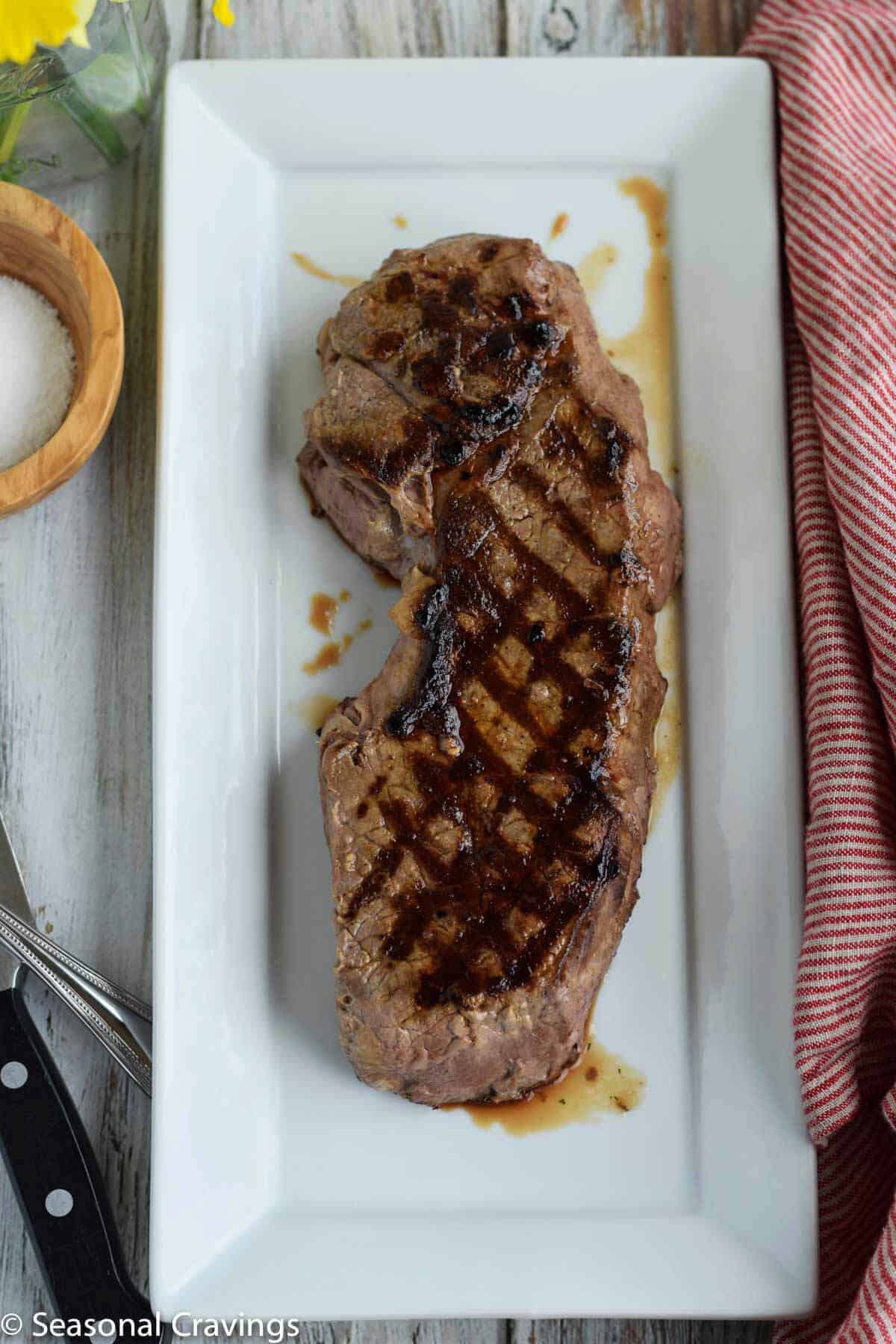 how to make Tender London Broil on a white plate