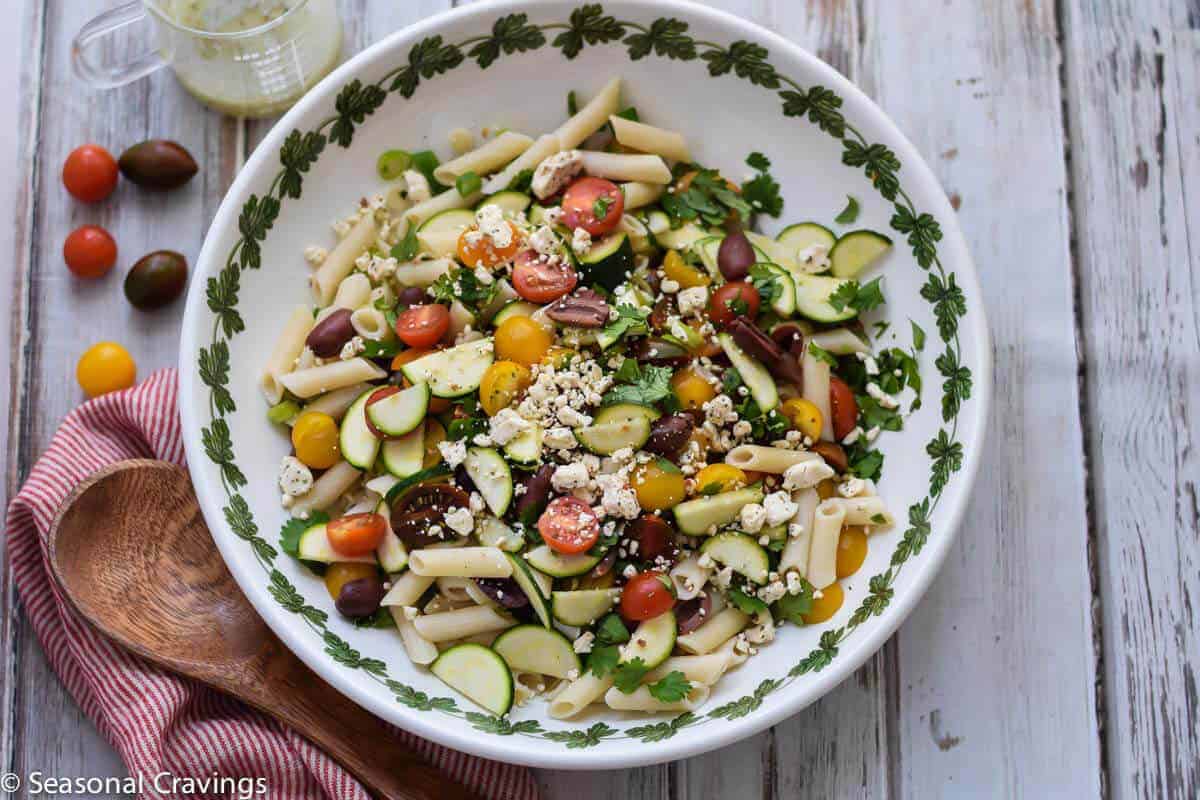Greek Pasta Salad with tomatoes, zucchini and feta cheese