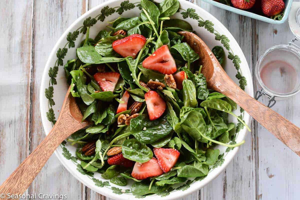 Strawberry Pecan Salad tossed with dressing