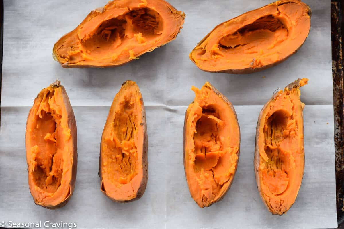 Baked Sweet Potatoes with Egg on white parchment paper