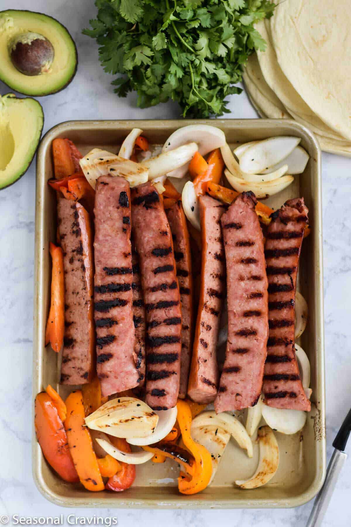 Grilled Sausage Tacos on a sheet pan with onions and peppers