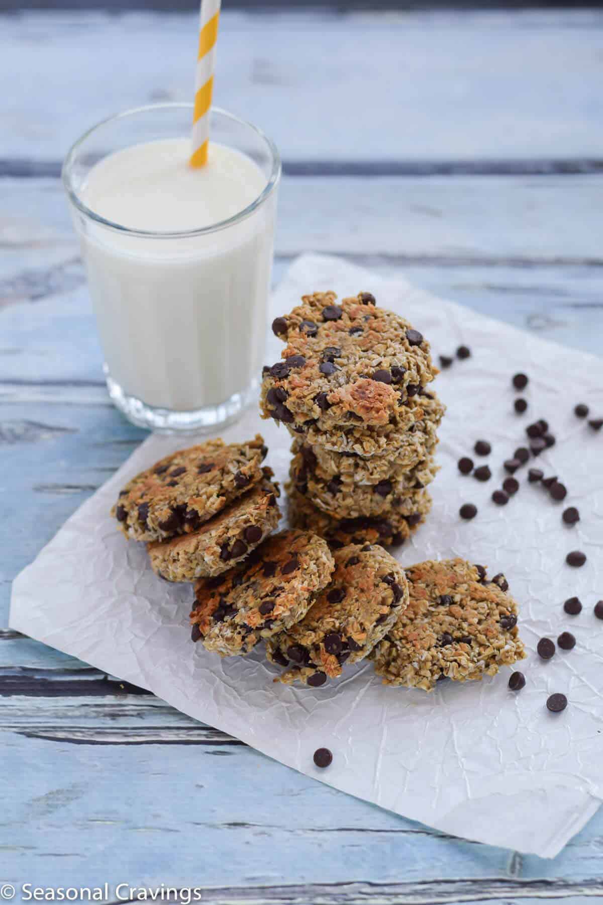 Gluten Free Breakfast Cookies with a glass of milk on blue background