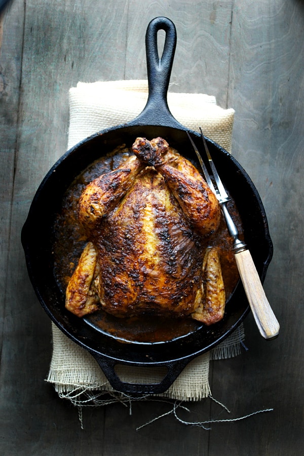 Rotisserie Inspired Roasted Chicken in a cast iron skillet