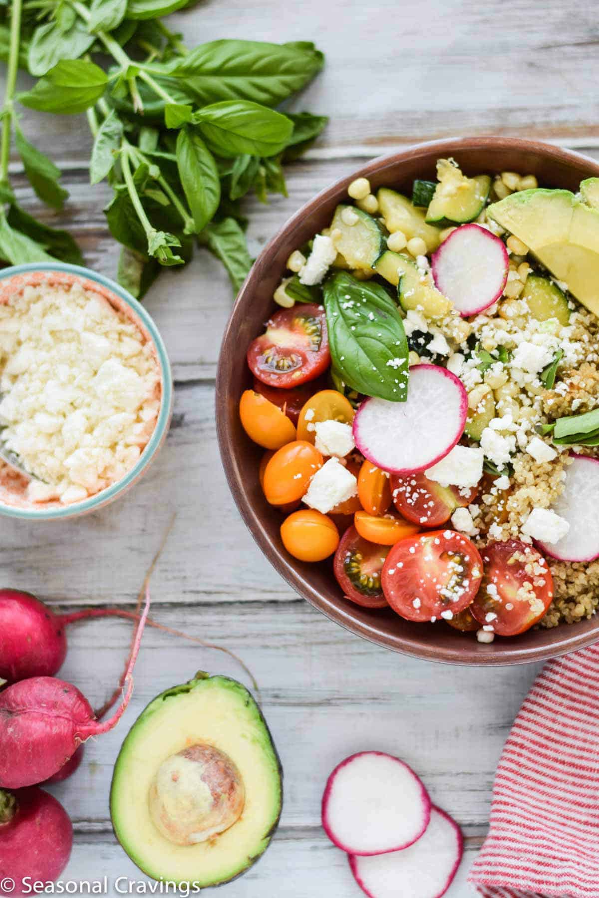 Late Summer Quinoa Grain Bowl with basil and feta on the side