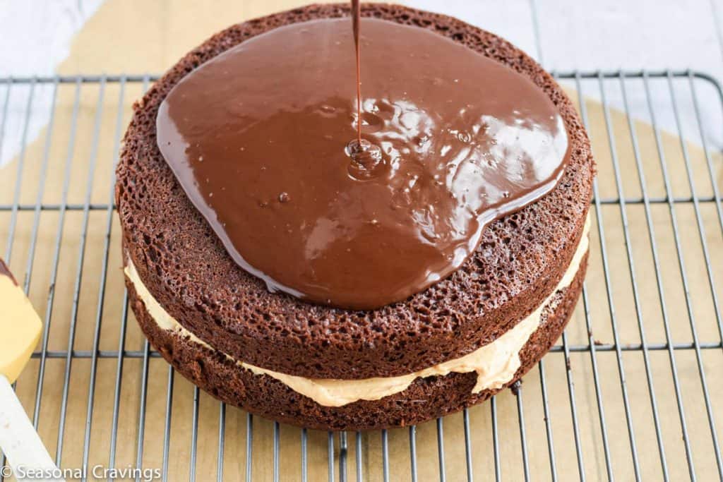 Chocolate Cake with Pumpkin Filling - moist chocolate cake, filled with creamy sweet pumpkin filling topped with a not too sweet chocolate ganache