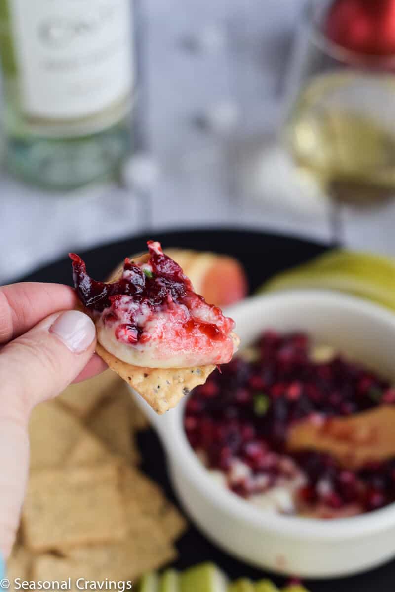 Pomegranate Cranberry Baked Brie is the perfect sweet and salty appetizer for any party.