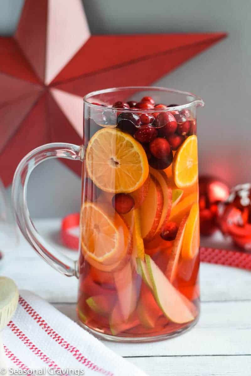 White Sangria in a pitcher with a red star in background 