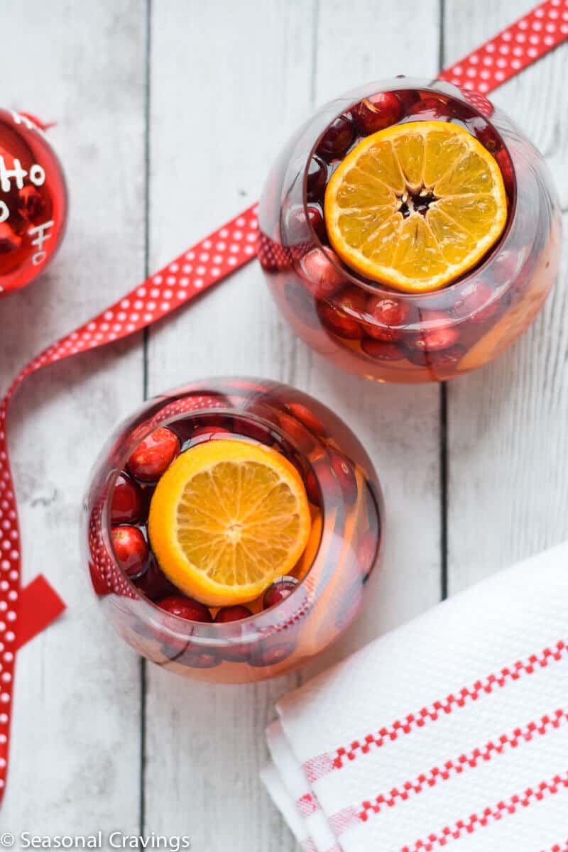 White Sangria in two glasses with a red ribbon