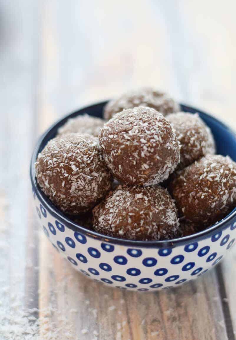 Chocolate Almond Butter Protein Balls in a blue bowl