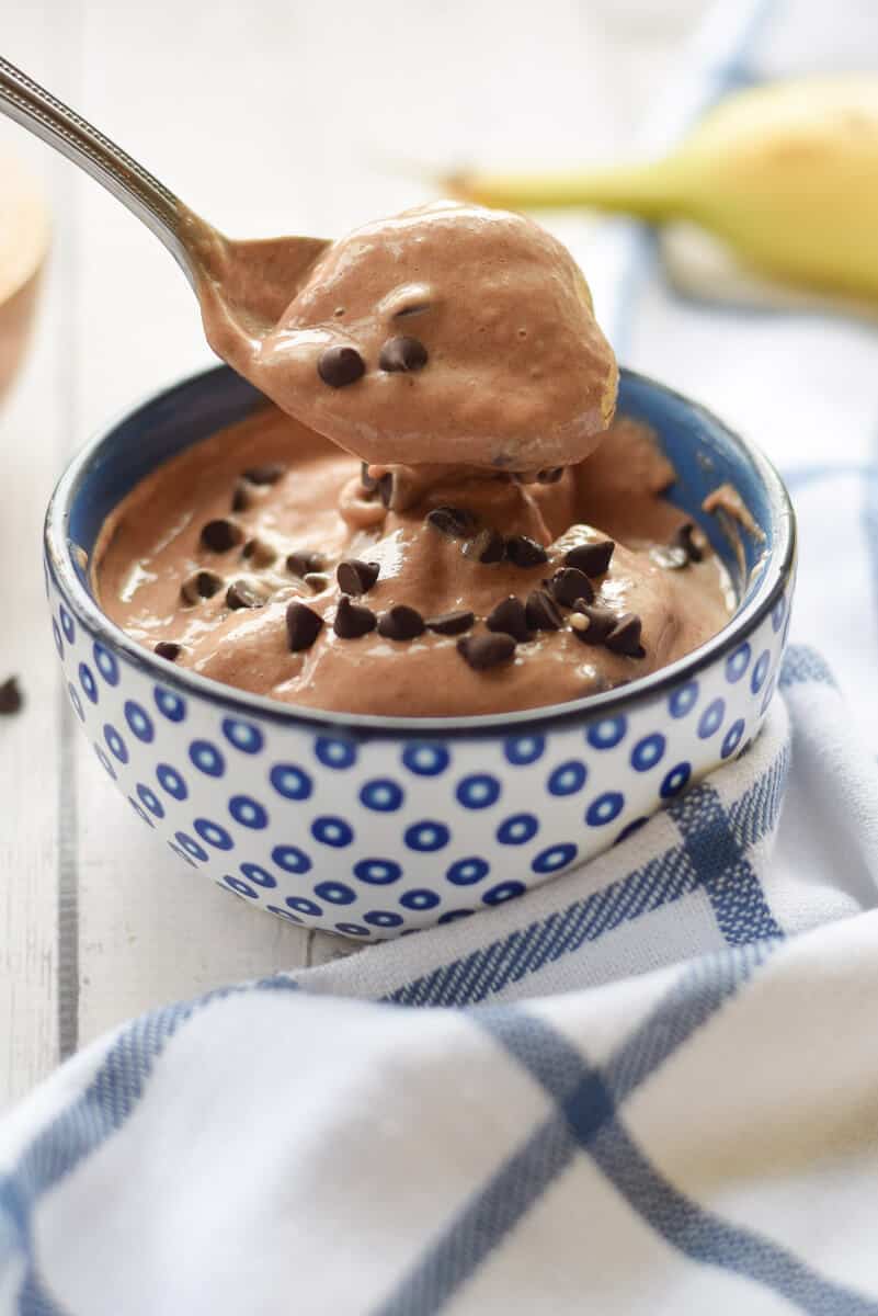 Chocolate Banana Ice Cream in a bowl with a spoon