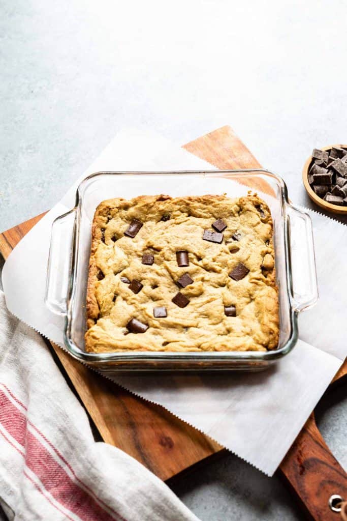 gluten free peanut butter blondies with chocolate chips in a pan
