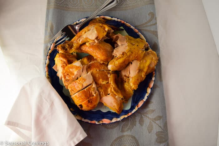 Easy Roast Chicken cut up on a plate