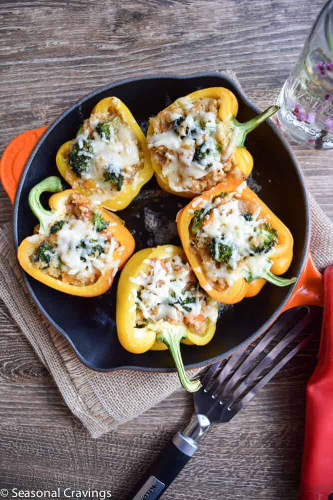 Quinoa Stuffed Peppers in a cast iron skillet