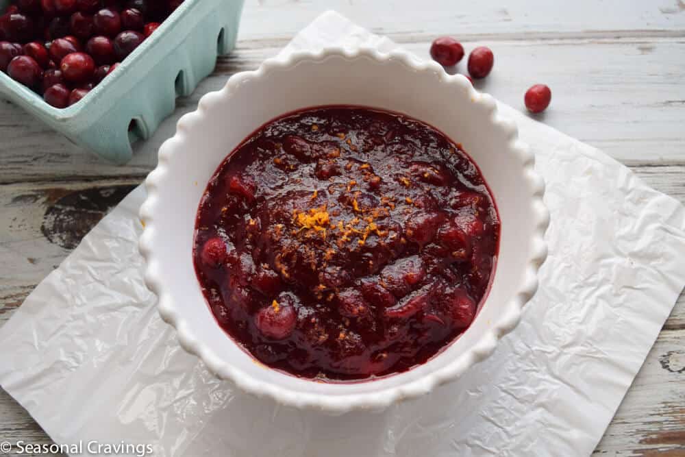 Cranberry Pomegranate Sauce in a white bowl