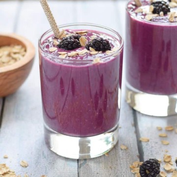 Blackberry Cobbler Smoothie with blackberries and a straw