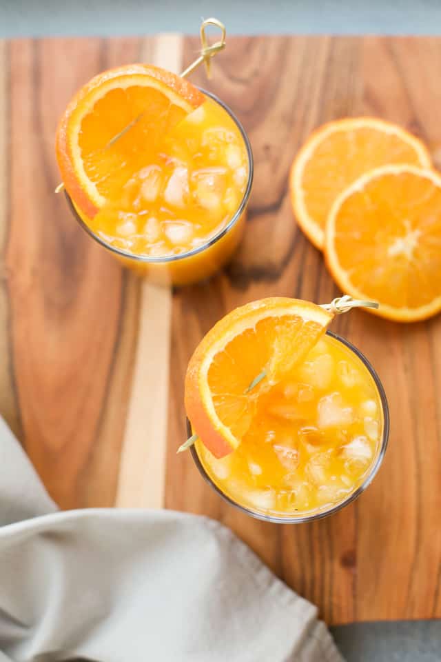 Turmeric Tea Recipe with orange garnish