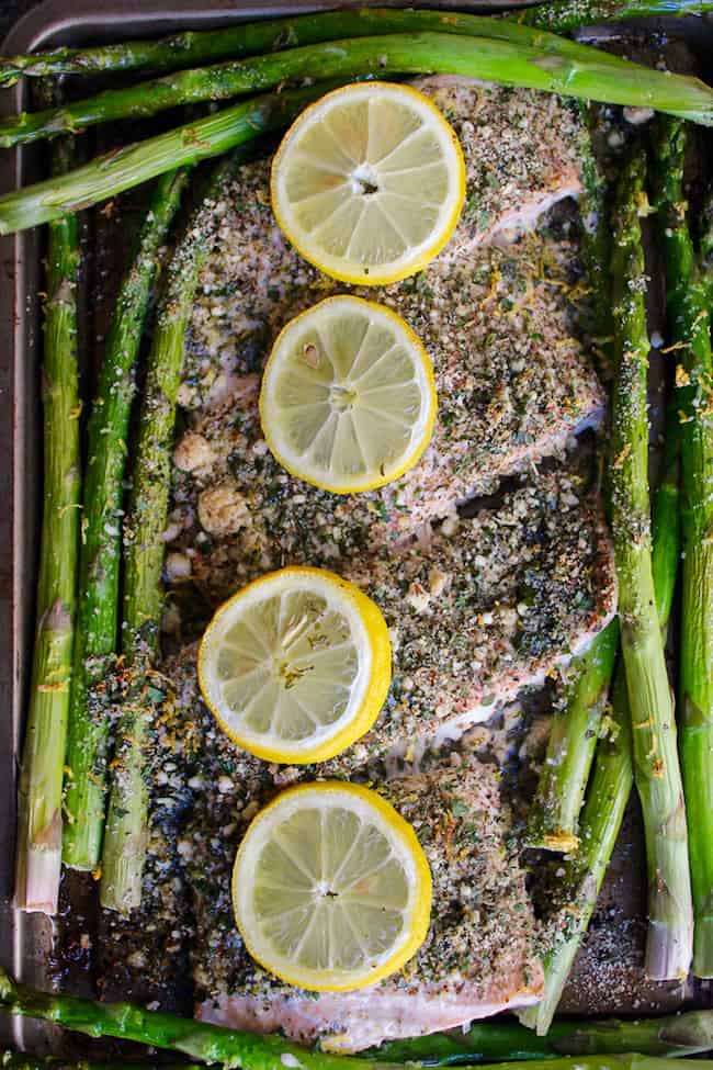 Almond and Herb Crusted Salmon with lemon and asparagus on a sheet pan