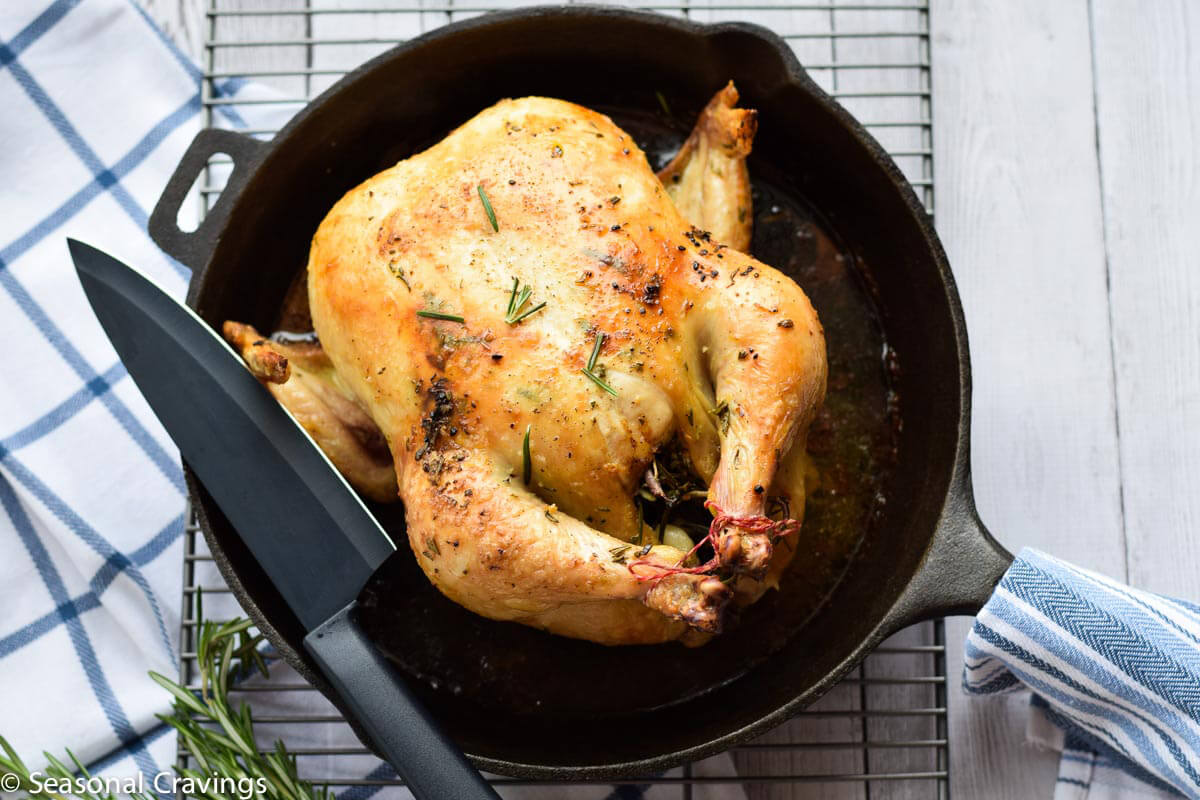 Roasted Rosemary Lemon Chicken in a cast iron skillet.