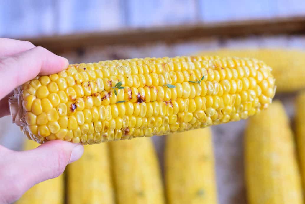 corn on the cob in the oven with thyme and butter 