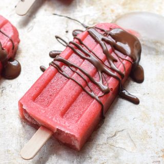 Strawberry Popsicles with Chocolate Drizzle are the perfect healthy summer treat.