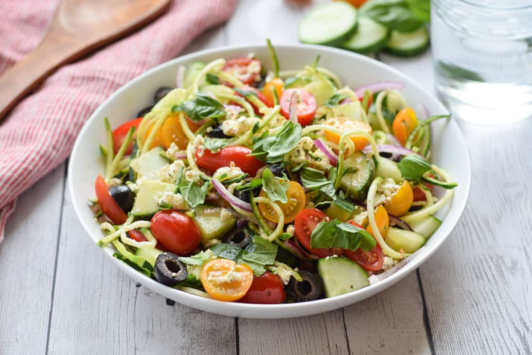 Greek Zucchini Noodle Salad in white bowl