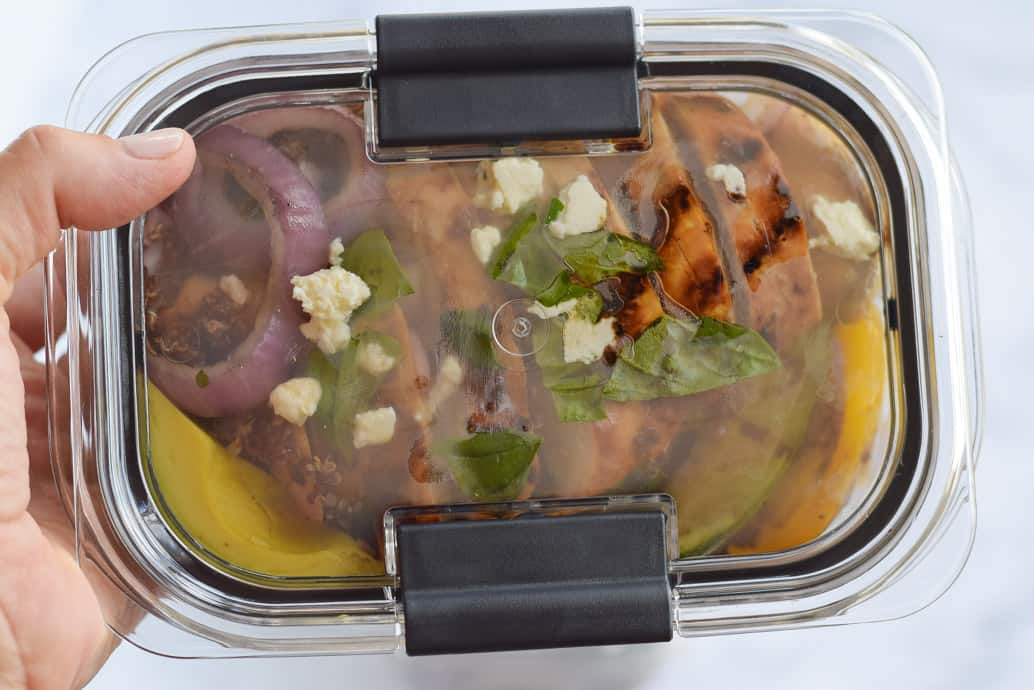 Meal Prep Grilled Chicken Grain Bowls in clear container with lid