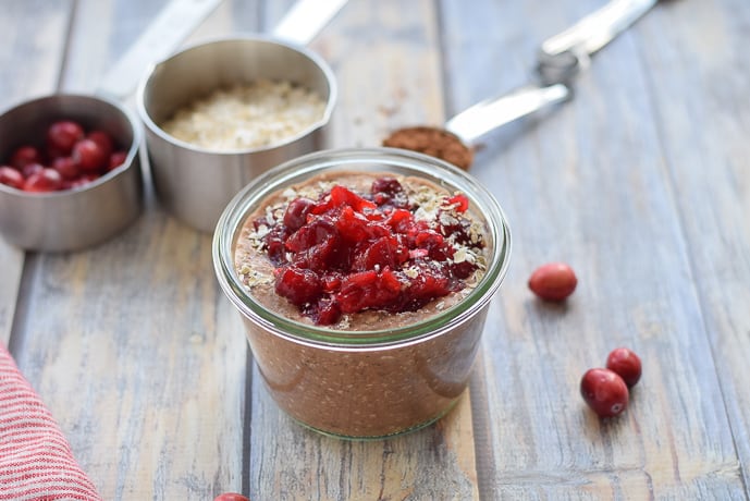 Cranberry Chocolate Overnight Oats with sauce on top