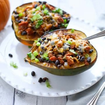 Sausage Stuffed Acorn Squash with melted cheese