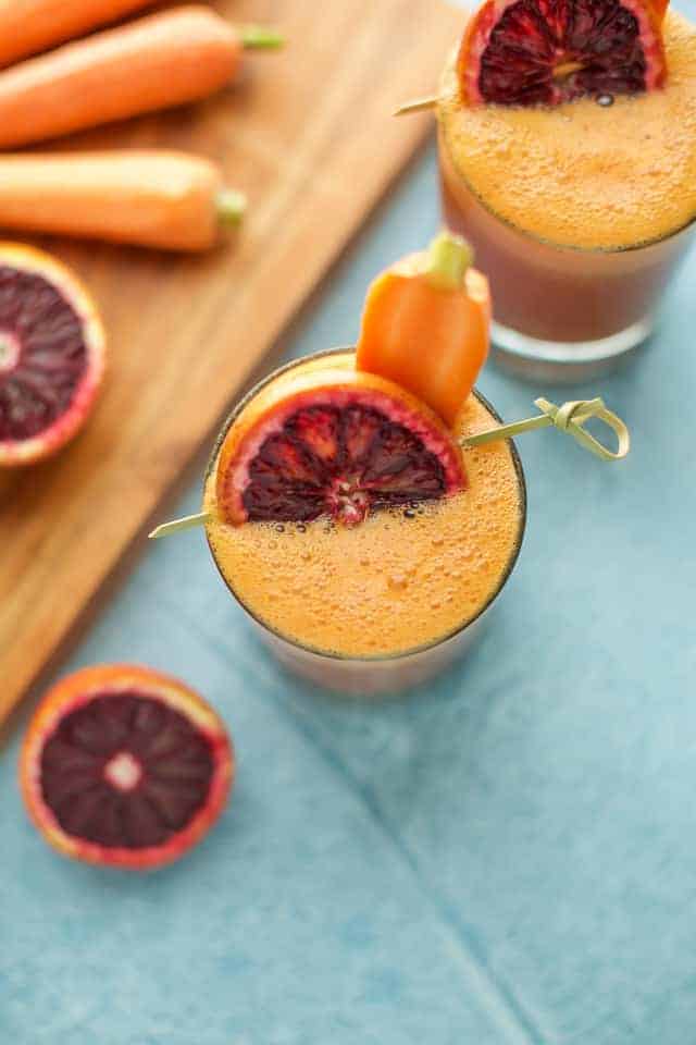 Blood Orange, Carrot and Turmeric Smoothie with carrot and blood orange garnish