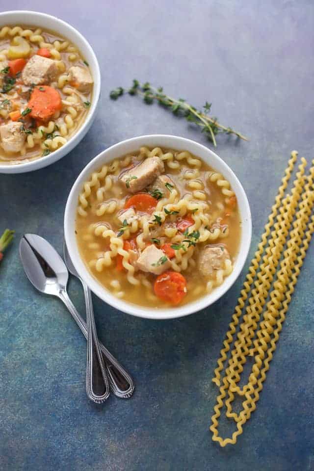 Instant Pot Chicken Soup in a white bowl