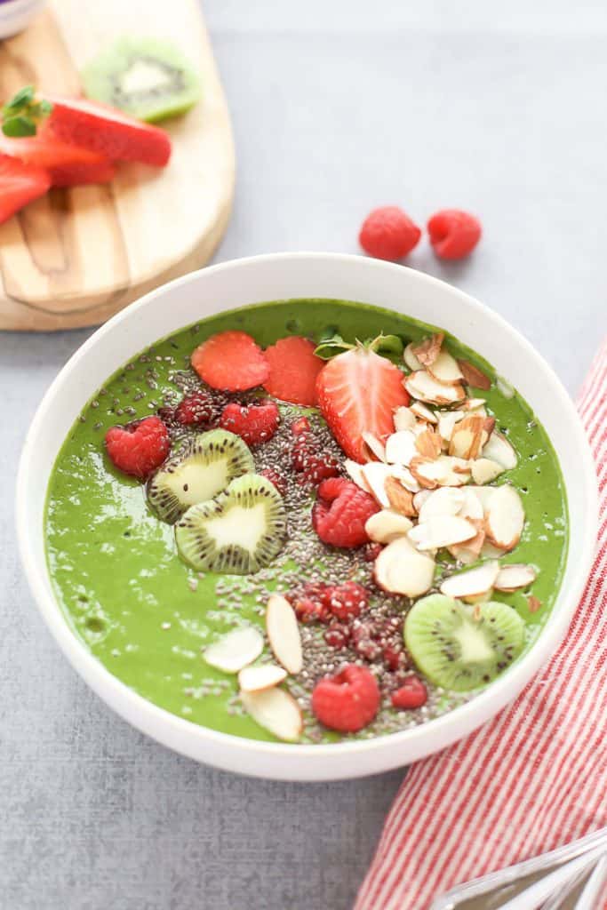 Green Smoothie Bowl topped with chia seeds, almonds and berries