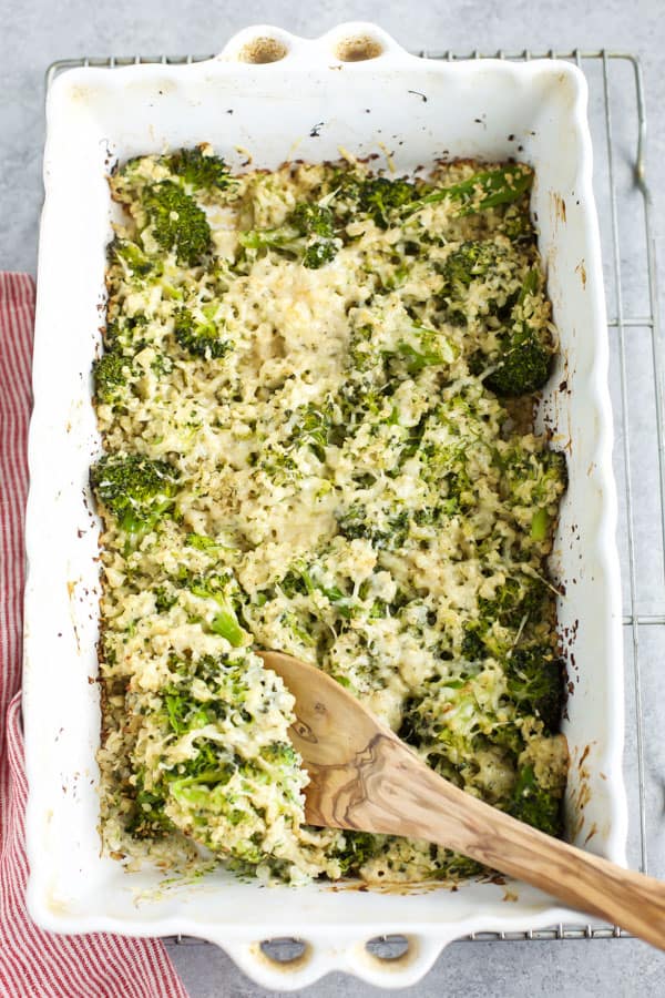 alfredo cauliflower broccoli bake in a casserole dish