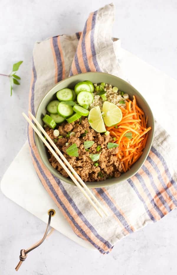 Indonesian beef and quinoa bowl with chopsticks