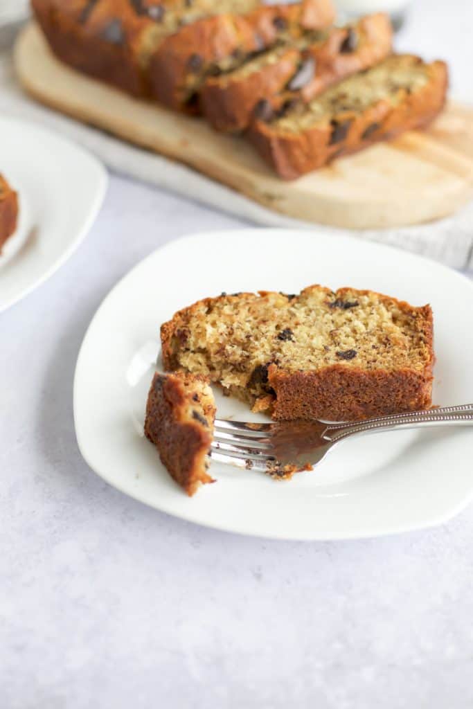 gluten free banana bread recipe slice on white plate