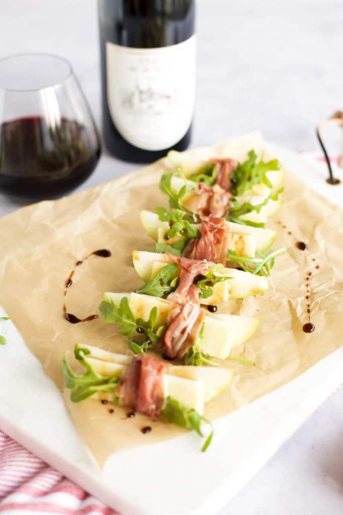 pears wrapped with prosciutto and arugula