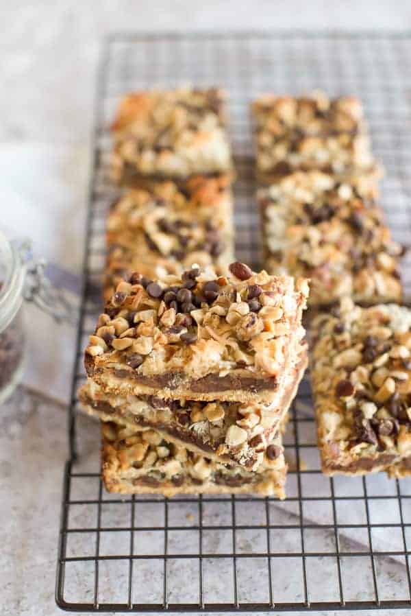 Gluten Free Seven Layer Bars are packed full of chocolate and coconut stacked up.