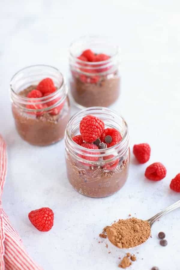 chocolate chia pudding in three jars