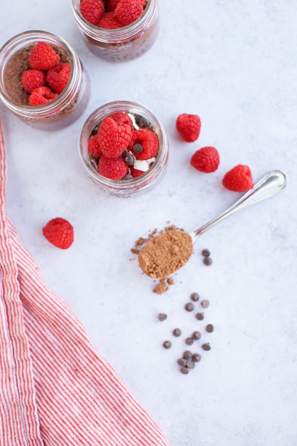 whole30 chia pudding with cocoa powder in a spoon