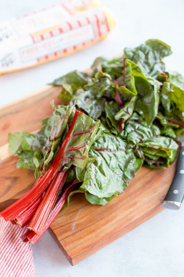 swiss chard on a cutting board