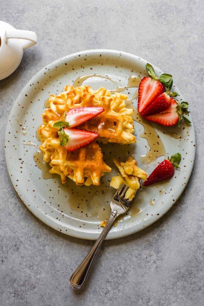 gluten free waffle with strawberries and sryup