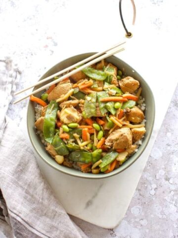 overhead view of chicken stir fry in a bowl