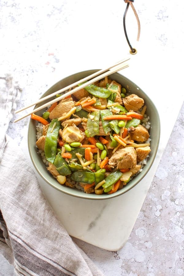 overhead view of chicken stir fry in a bowl