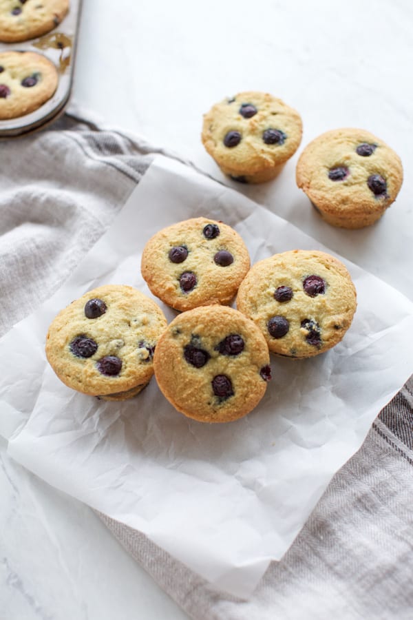 keto blueberry muffins on parchment paper