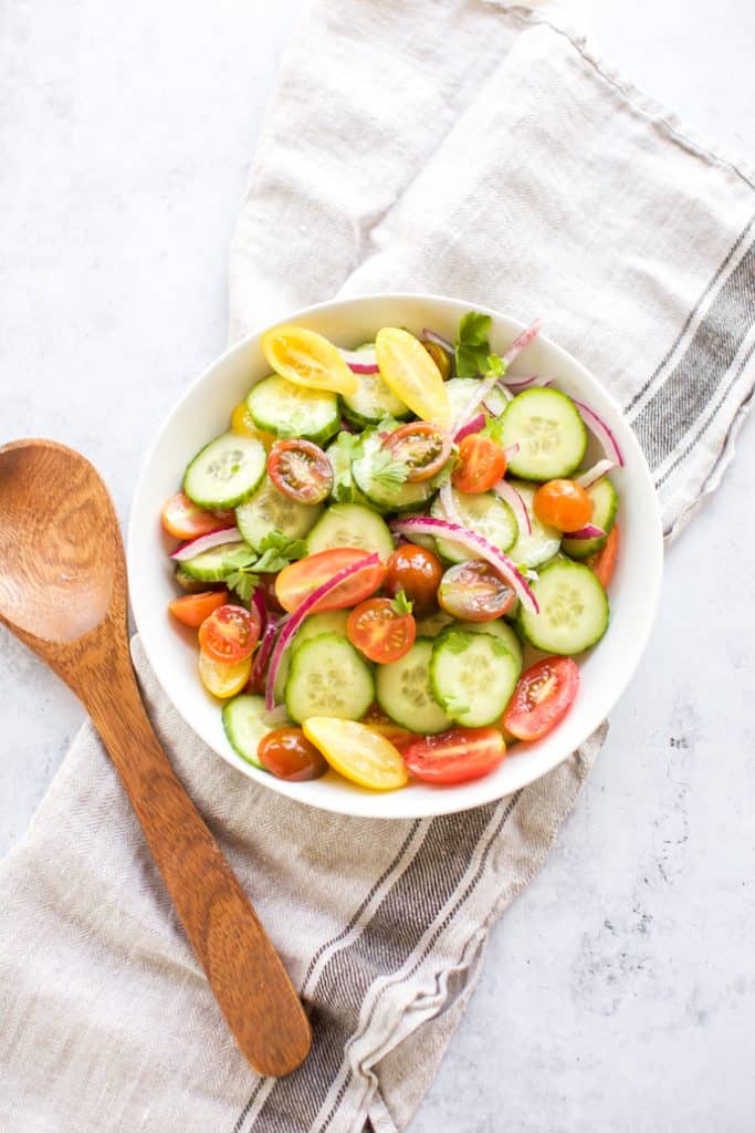 cucumber, tomato and onion salad with dressing