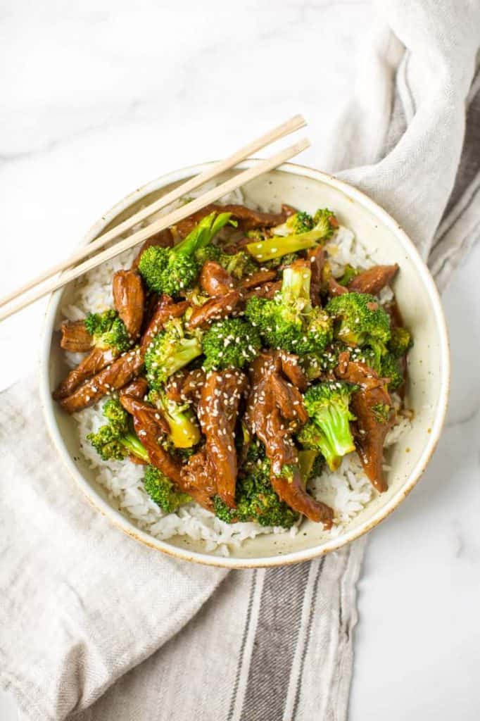 instant pot beef and broccoli with chopsticks