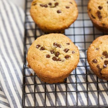 Gluten free chocolate chip muffins on a cooling rack.